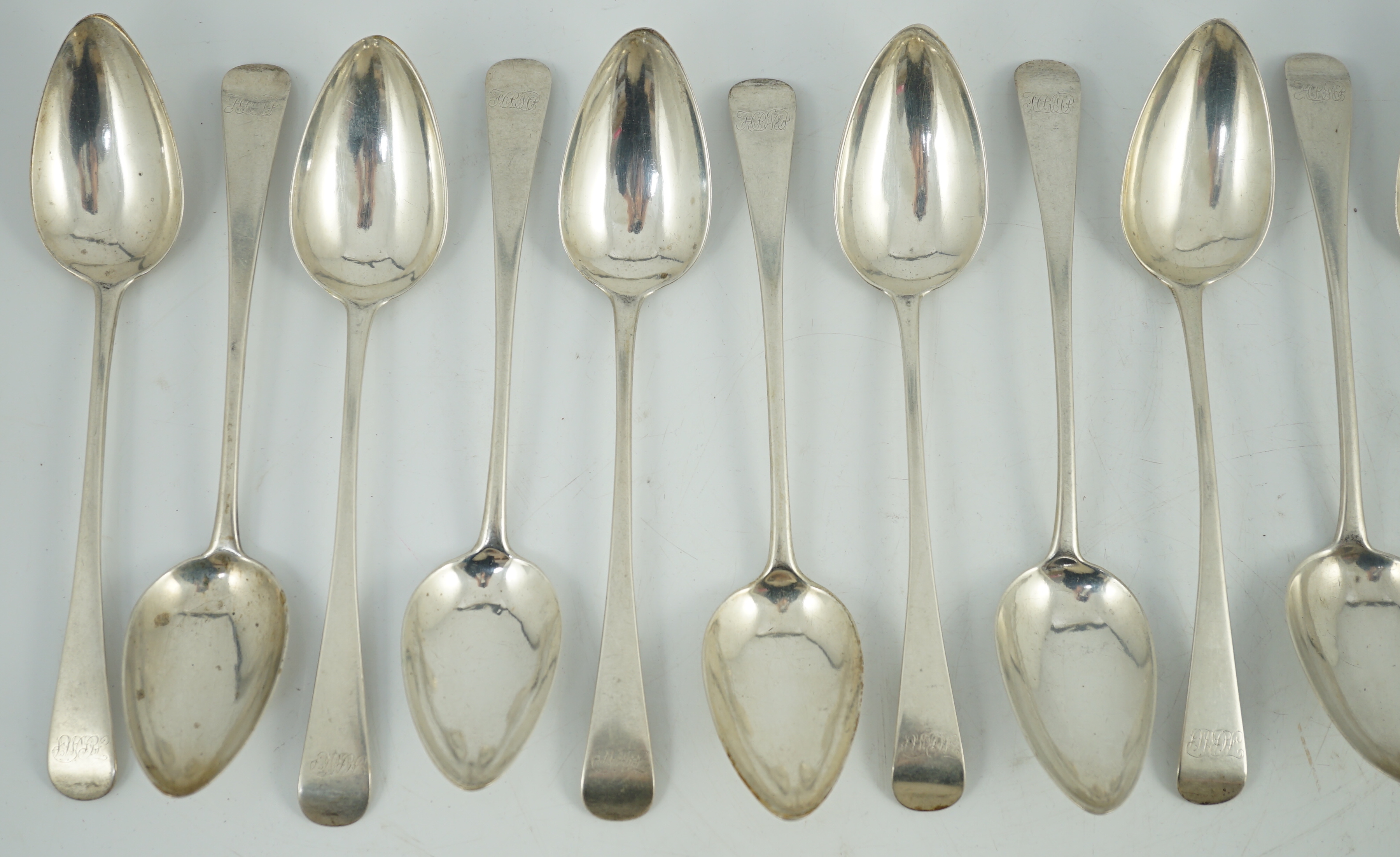 A rare set of twelve George III provincial Scottish silver Old English pattern table spoons, by David Isat, Banff